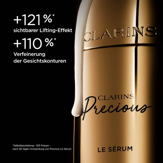 Clarins Precious Le Sérum auf schwarzem Hintergrund mit Textinfo zur Straffung und Verbesserung der Hautkonturen.