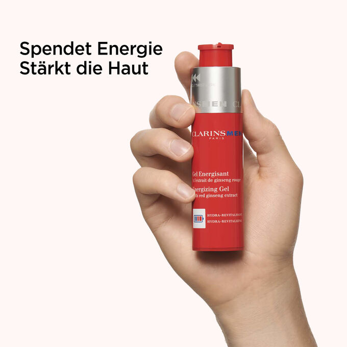 Männerhand mit Pumpspender Gel Energetisant für Männer und Infotext, dass das Produkt Energie spendet und die Haut stärkt.