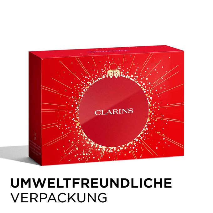Clarins Weihnachtsgeschenkset mit umweltfreundlicher Verpackung, die Nachhaltigkeit unterstreicht.
