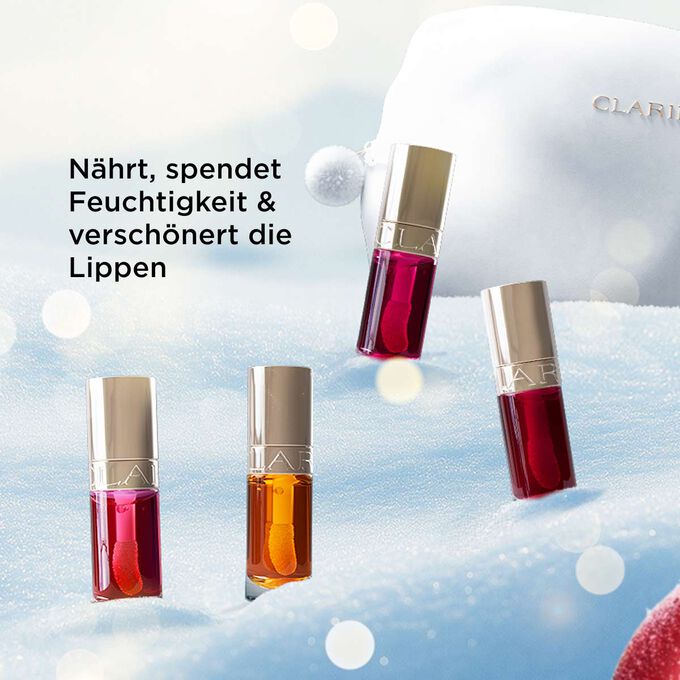 Clarins Weihnachtsset mit vier Lippenölen die nähren, hydratisieren und die Lippen mit natürlichem Glanz verschönern.