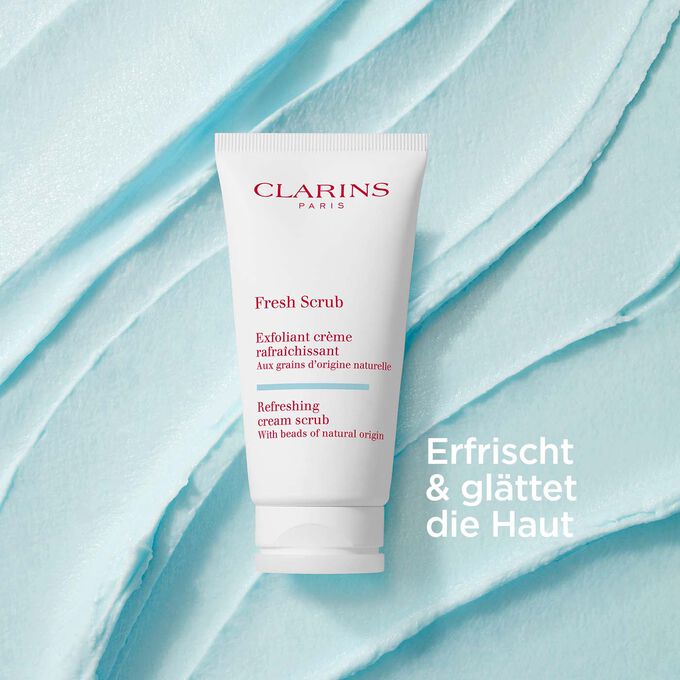 Clarins Fresh Scrub für das Gesicht auf einem strukturierten Creme- Hintergrund mit Textinfo, glättend und erfrischend.