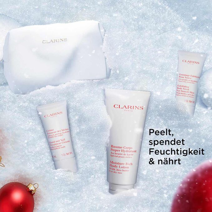 Weihnachtliches Geschenkset von Clarins mit Peeling, feuchtigkeitsspendender und nährender Hautpflege für zarte Haut