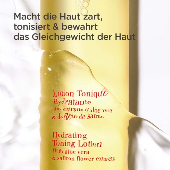 Lotion Tonique Hydratante halb unter Wasser, unterstreicht ihre feuchtigkeitsspendende, zartmachende und straffende Wirkung Lotion Tonique Hydratante halb unter Wasser, unterstreicht ihre feuchtigkeitsspendende, zartmachende und straffende Wirkung