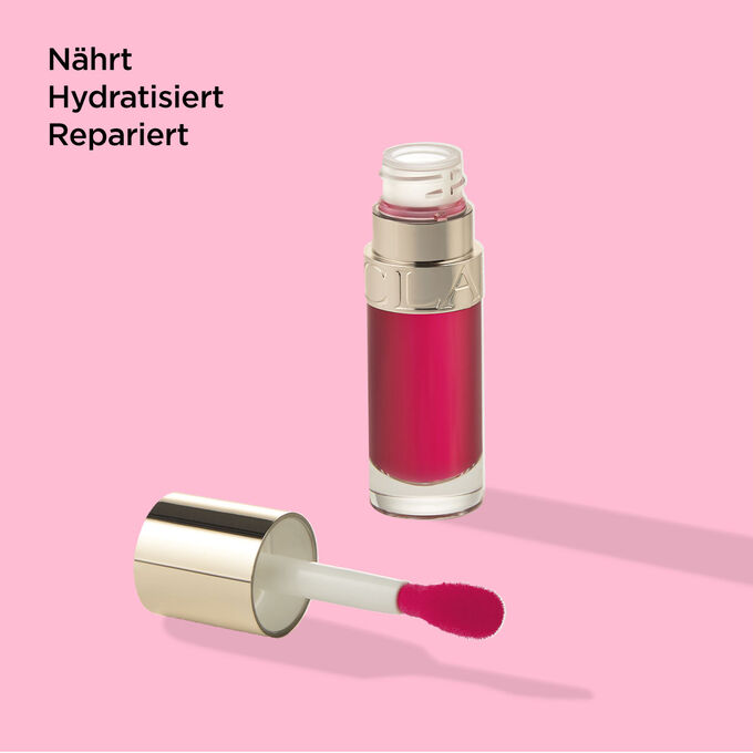 Clarins Lip Comfort Oil 04 Pitaya mit Textinfo, dass es nährende, hydratisierende und reparierende Eigenschaften hat