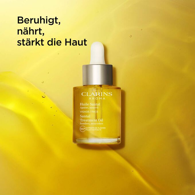 Clarins Huile Santal Gesichtspflegeöl, mit Text, der die pflegende  Wirkung des Produkts hervorhebt