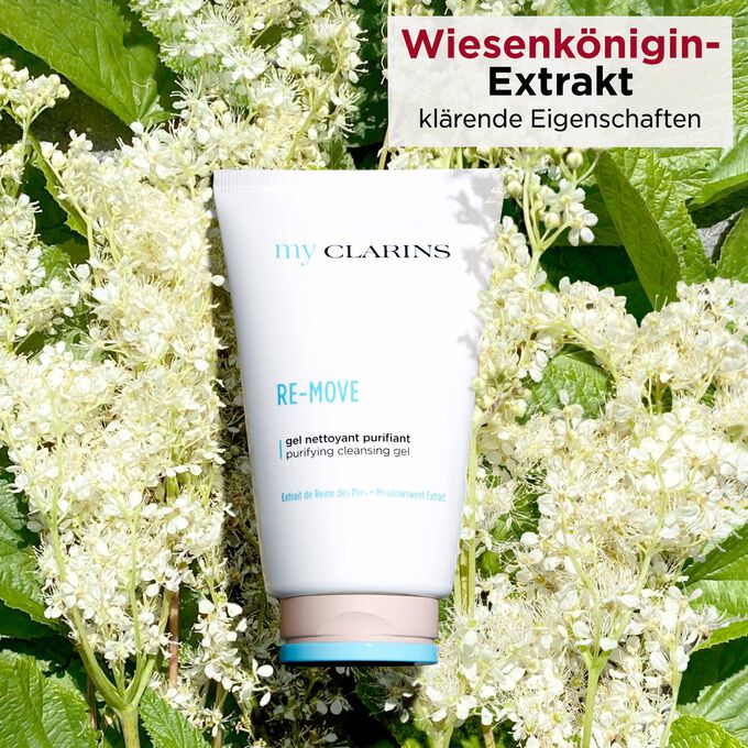 My Clarins Re-Move Purifying Cleansing Gel inmitten von Wiesenkönigin-Blüten liegend und Textinfo, dass deren Extrakt klärt