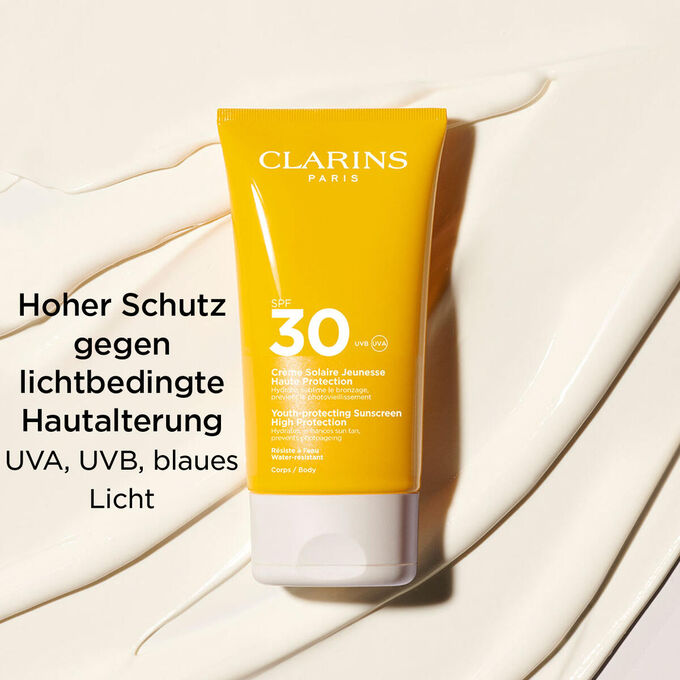 Tube Clarins Cr&egrave;me Solaire Jeunesse SPF 30 f&uuml;r den K&ouml;rper mit Textinfo zum hohen Schutz vor UVA, UVB und blauem Licht.
