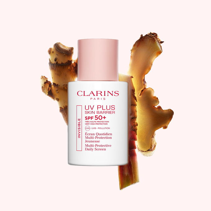 Flakon Sunblocker Clarins UV Plus vor Ingwerscheiben, um dessen wichtigsten nat&uuml;rlichen Aktivstoff hervorzuheben.