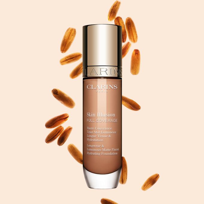 Clarins Skin Illusion Full Coverage showcasing its sleek design and vibrant packaging, the ideal foundation for a flawless & natural complexion.