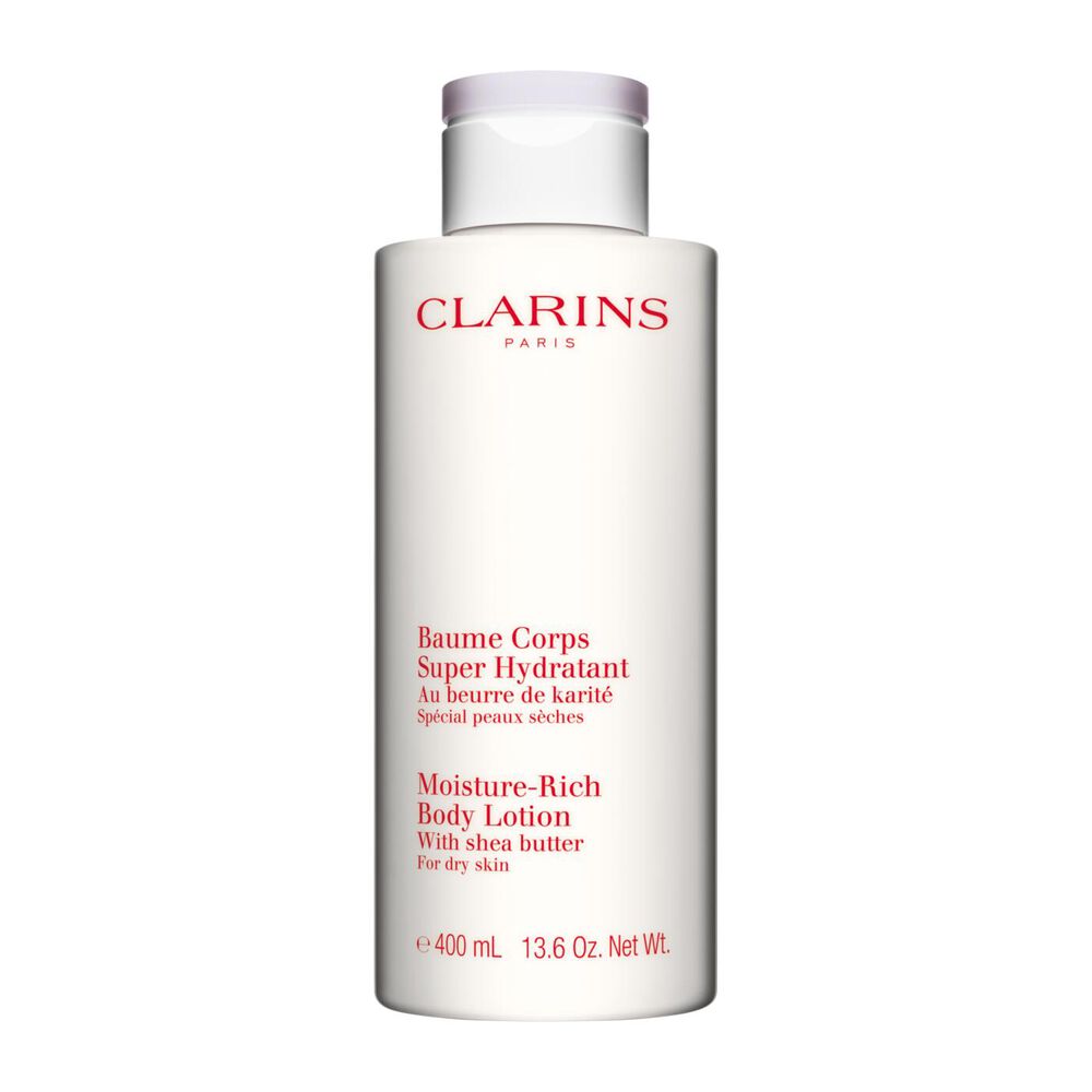 Flakon Clarins Body Lotion Baume Coprs Super Hydratant mit zwei Shean&uuml;ssen auf wei&szlig;en Hintergrund