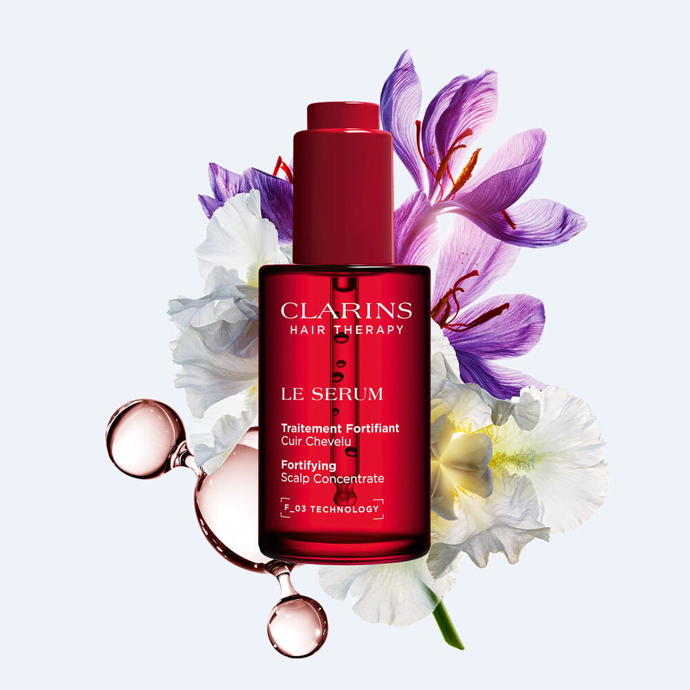 Clarins Kopfhautserum f&uuml;r l&auml;ngere Lebensdauer und h&ouml;here Dichte des Haars, angereichert mit Safran und Bio-Pflanzenextrakten f&uuml;r eine gesunde Kopfhaut.