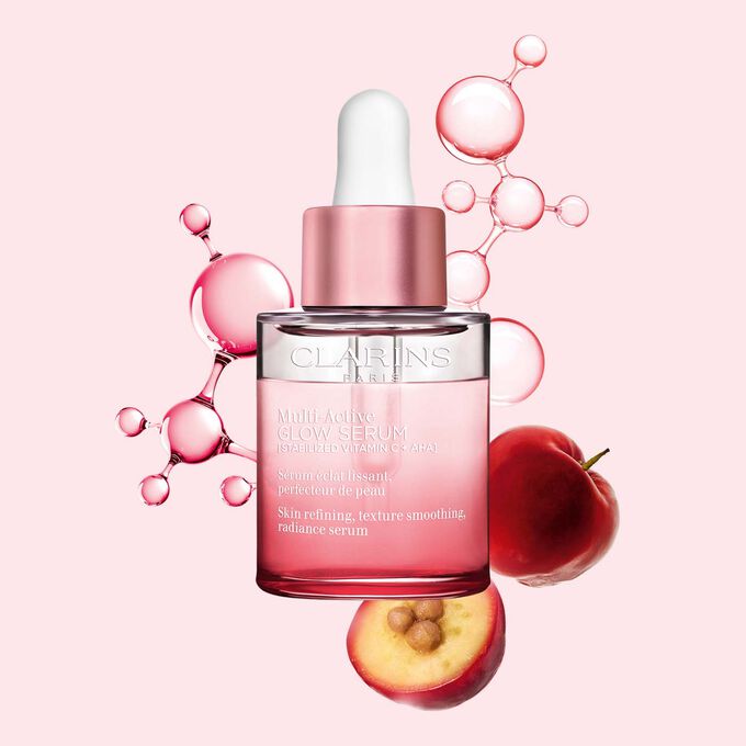 Flakon Multi-Active Glow Serum mit Vitamin C-Molek&uuml;l und Acerola auf hellrosa Hintergrund unterst&uuml;tzen die Ausstrahlung