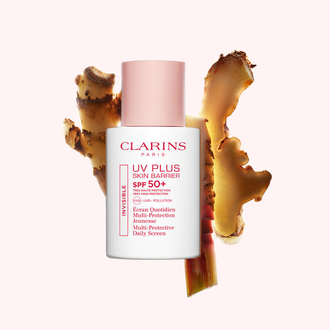 Flakon Sunblocker Clarins UV Plus vor Ingwerscheiben, um dessen wichtigsten nat&uuml;rlichen Aktivstoff hervorzuheben.