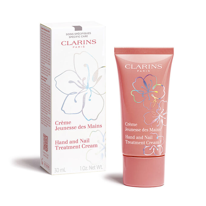 Photoshoot of a tube of Clarins limited edition Fairy Blossoms Hand Cream with its elegant secondary recyclable packaging.