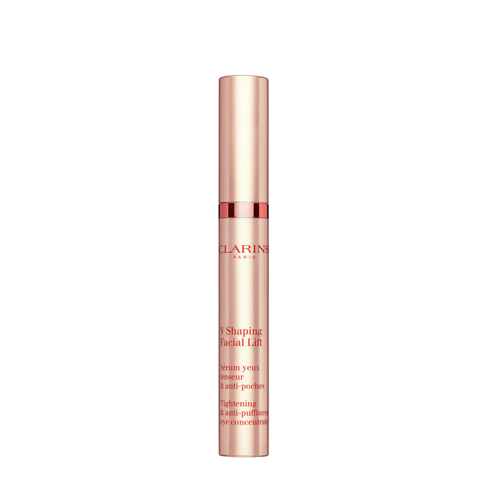 Applikator-Flakon V Shaping Facial Lift Augenserum von Clarins mit Irisch Moos auf rosafarbenem Hintergrund