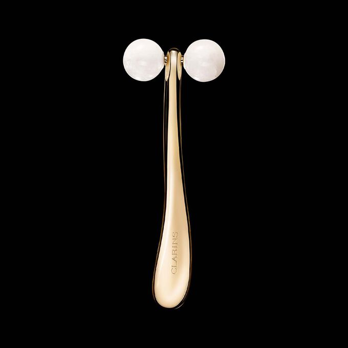 Clarins Precious Roll-On vor schwarzem Hintergrund